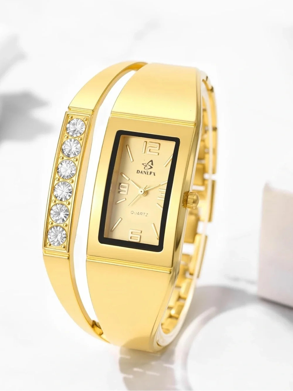 Anthropologie Gold-tone Crystal Accent Bangle Watch